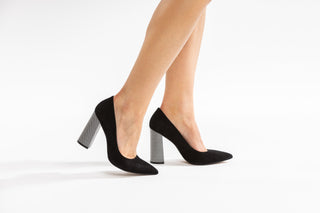 Capelli Rossi Black Suede Pump with Black and White checkered block high heel and pointed toe, modelled with feet and legs, Alex, The Shoe Curator