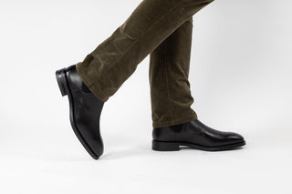 Loake, Chatsworth, Black leather ankle boot with slim squared toes and elastic sides modelled with feet and legs, The Shoe Curator