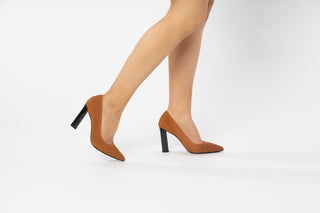 A Mustard/Dark Camel coloured suede pump with shiny black block heels