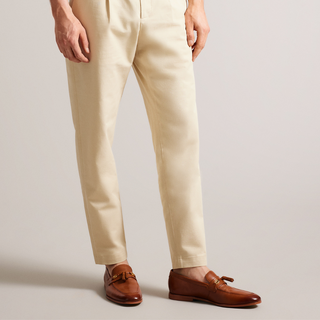 Ainsly by Ted Baker is a classic tan gentlemans loafer with gold buckle and tassle details