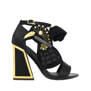Kat Maconie, Aya, Black suede and patent shoe with open toes and bird detailing with gold and pom pom extras, block heel with gold edging, The Shoe Curator