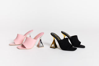 Kat Maconie black suede leather mule heel, open toe. Gold heels stacked on a crystal gem in the heel and the pink matching heels