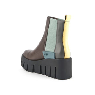 United Nude brown leather platform boot with yellow and blue features and a black lug sole