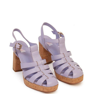Mandy sandal in lilac by Kathryn Wilson has a 10.5cm heel and 2cm platform under the toe, buckle fastening at the ankle and cork-finished heel design
