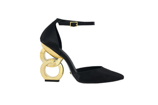 Kat Maconie, Emmi, Black leather heel with pointed toes and thin strap, gold patent chain heel, The Shoe Curator