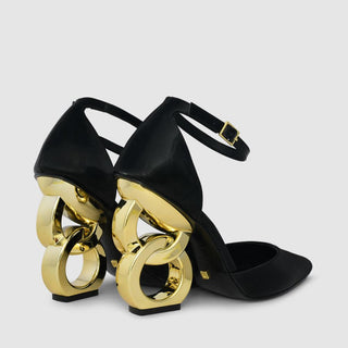 Kat Maconie, Emmi, Black leather heel with pointed toes and thin strap, gold patent chain heel, The Shoe Curator