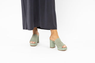 Unisa, Amy, Teel suede pump with peeped toe and open back with block croc patterned heel styled with grey long dress and modelled with feet and legs, The Shoe Curator
