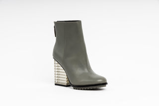 United Nude, Hi Rise, Grey leather boot with zip and sole tread and a clear see through heel, The Shoe Curator