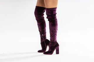 Gianni Meliani, Lux, Mid-Thigh purple suede with pointed toe and block heel with zip on inner leg modelled with legs and feet, The Shoe Curator