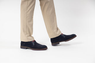 Fluchos. Carlos, Navy Blue suede shoe with croc patterned sides and back with red laces and maroon insole modelled with feet and legs, The Shoe Curator