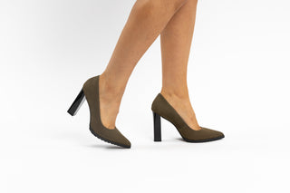 Capelli Rossi moss green suede with pointed toes and black patent block heel with black rubber tread modelled with feet and legs, Sheree, The Shoe Curator