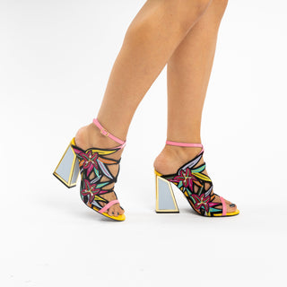 Kat Maconie, Calypso, black base with multicoloured flower designs and silver and gold patent block heel modelled with legs and feet, The Shoe Curator