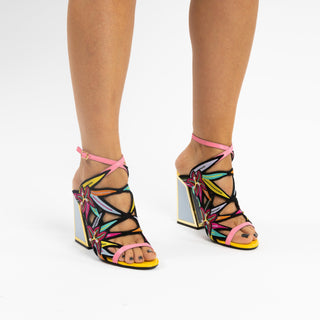Kat Maconie, Calypso, black base with multicoloured flower designs and silver and gold patent block heel modelled with legs and feet, The Shoe Curator