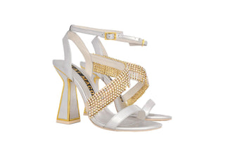 Kat Maconie, Mila, Silver leather buckle strap with crystal fringe down the foot with hourglass heel with gold edging, The Shoe Curator