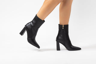 Billini, Mirie, Black High Rise leather boot with pointed toes and block heel modelled with feet and legs, The Shoe Curator