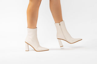 Billini, Mirie, White High Rise leather boot with pointed toes and block heel modelled with feet and legs, The Shoe Curator