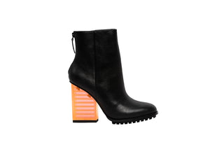 United Nude, Hi Rise, Black leather patent boot with zip and black sole thread with a see through orange heel, The Shoe Curator