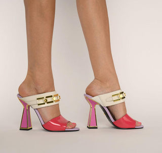 Kat Maconie, Ines, leather pastel coloured shoes with a white base and gold chain across the front, peeped toes and a pyramid heel with gold edging modelled with legs and feet, The Shoe Curator