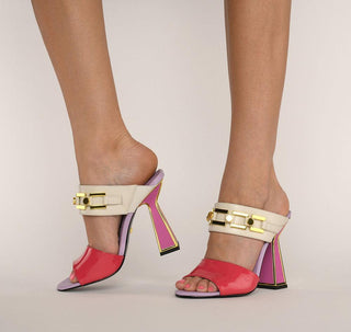 Kat Maconie, Ines, leather pastel coloured shoes with a white base and gold chain across the front, peeped toes and a pyramid heel with gold edging modelled with feet and legs, The Shoe Curator