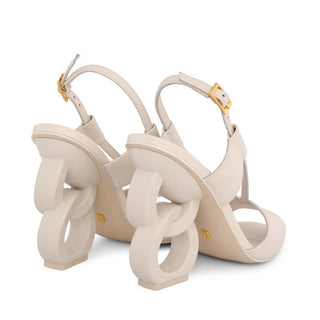 Kat Maconie, Halle, White leather heel with a V cut and peeped toes, adjustable gold detailed strap and white patent chain heel, The Shoe Curator