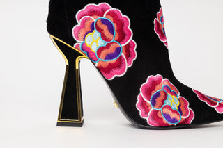 Kat Maconie, Lucie, Ankle boot with suede black and colourful flower designs with pointed toes and a zip on the back, hourglass black heel with gold edging, The Shoe Curator