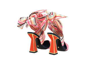 Kat Maconie, Ola, Pink leather closed pointed toe with red hourglass heel with gold edging and a multi-coloured satin style tie, The Shoe Curator