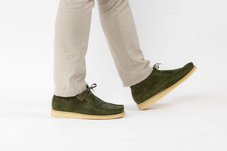 Ted Baker, Mihkey, Green suede loafers with laces and a cream textured sole styled with pants and modelled with feet and legs, The Shoe Curator
